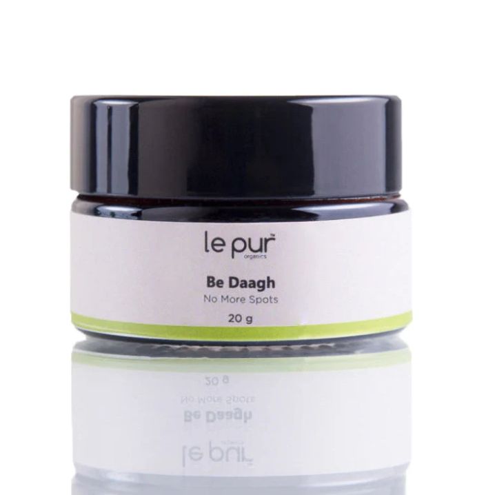 Be Daagh organic skincare product by Le Pur Organics showing a natural herbal-infused cream in a jar with leaves background.