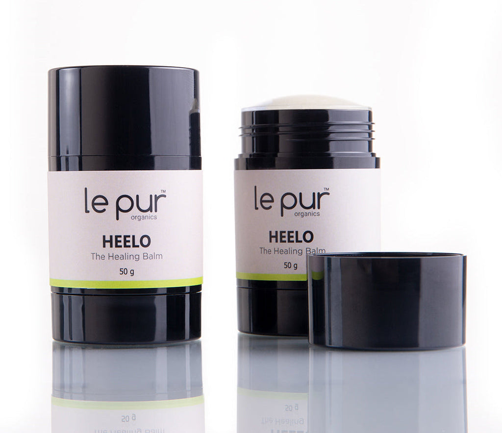 Organic skincare product from Le Pur Organics, featuring Heelo in a sleek bottle, showcasing natural ingredients and eco-friendly packaging.