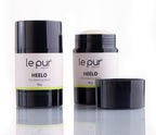 Organic skincare product from Le Pur Organics, featuring Heelo in a sleek bottle, showcasing natural ingredients and eco-friendly packaging.