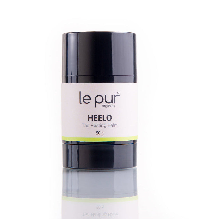 Heelo organic skincare product by Le Pur Organics, featuring natural ingredients in a sleek container, for healthy, glowing skin.