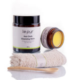 Le Pur Organics hot cloth cleansing balm trial pack featuring organic skincare product in a jar with a cloth for gentle cleansing.