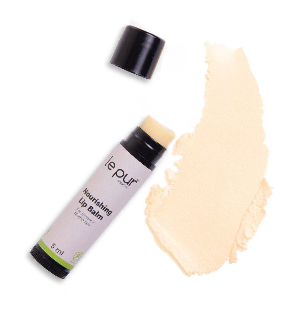 Le Pur Organics nourishing lip balm in a sleek tube, designed to hydrate and protect dry lips with organic ingredients.