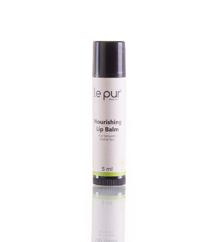 Le Pur Organics nourishing lip balm in a small jar, featuring a smooth, hydrating formula for soft lips.