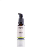 Le Pur Organics Sérum De C in a glass bottle with dropper, featuring bright orange liquid, for radiant skin and vitamin C boost.