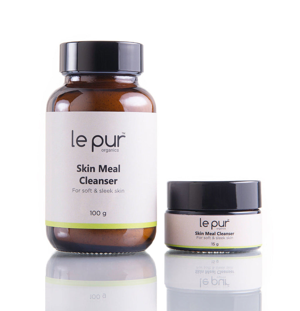 Le Pur Organics Skin Meal Cleanser in a clear bottle with a white pump, showing a gentle, organic facial cleanser with botanical ingredients.