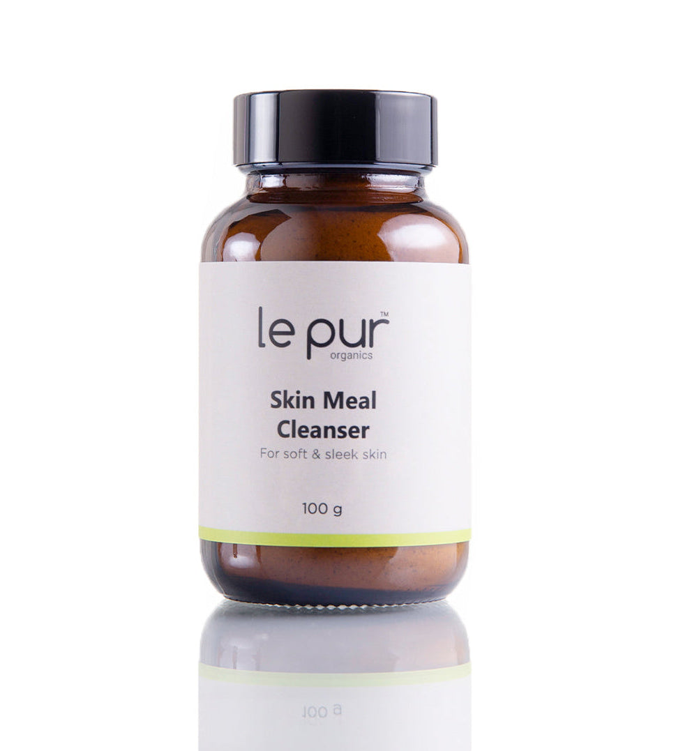 Le Pur Organics Skin Meal Cleanser in a clear bottle with a pump, featuring a natural, organic skincare formulation.