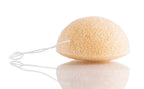 Le Pur Organics konjac cleansing sponge showing soft, natural konjac fiber texture for gentle facial cleansing.
