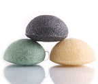 Le Pur Organics KONJAC cleansing sponge showing a natural, beige konjac sponge with a textured surface for gentle facial cleansing.