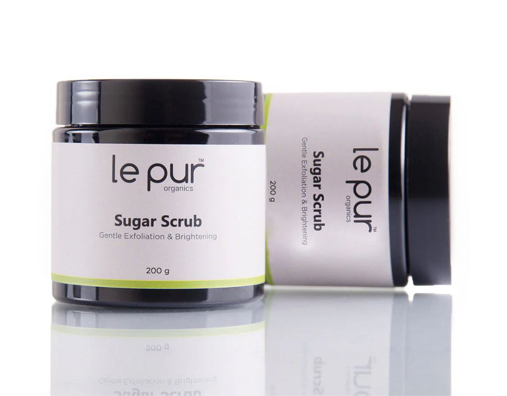 Organic sugar scrub by Le Pur Organics featuring a jar of exfoliating sugar scrub with natural ingredients for smooth skin.
