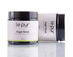 Organic sugar scrub by Le Pur Organics featuring a jar of exfoliating sugar scrub with natural ingredients for smooth skin.
