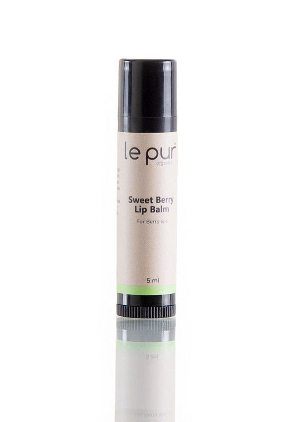 Le Pur Organics Sweet Berry Lip Balm in a small jar, showcasing its vibrant berry-colored balm for soft, moisturized lips.
