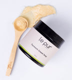 Le Pur Organics turmeric cream soap with natural ingredients, showcasing a bar of organic skincare soap for radiant skin.