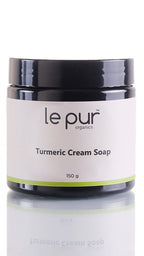 Le Pur Organics turmeric cream soap bar showing a natural, creamy soap with turmeric extract for organic skincare.