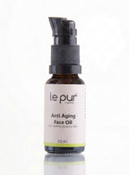 Le Pur Organics age defying face oil bottle with dropper, featuring sleek packaging and organic skincare  Ingredient visual featuring Sea Buckthorn and CoQ10 alongside Age Defying Face Oil bottle. 