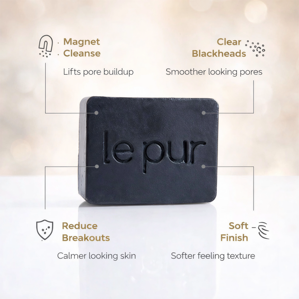 Black Beauty charcoal soap bar lathered in hands showing rich foam for a deep clean without a heavy feel